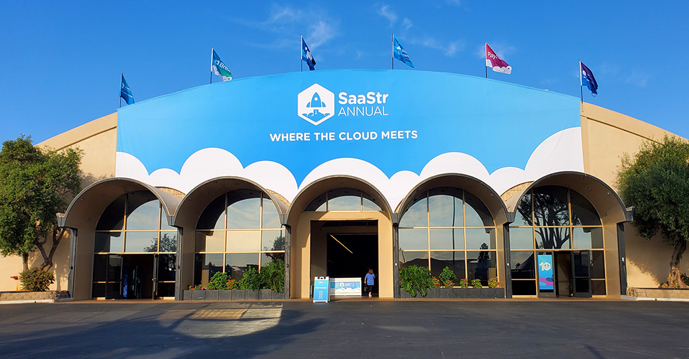 entrance hall for saastr - semi-circle shaped conference hall with blue saastr banner