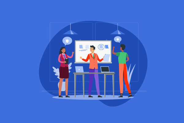 SaaS professional services team standing in front of white board