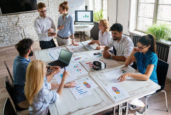 startup founders around conference table performing category creation
