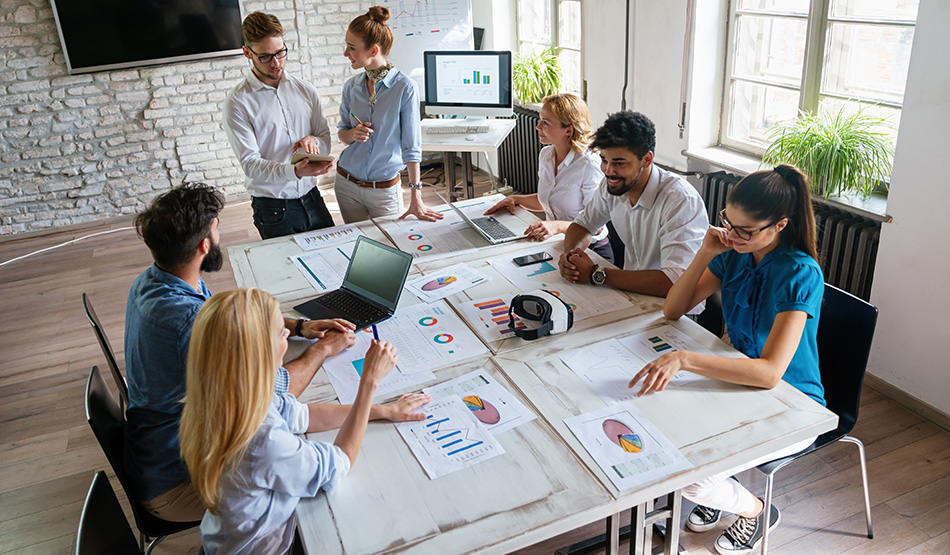 startup founders around conference table performing category creation