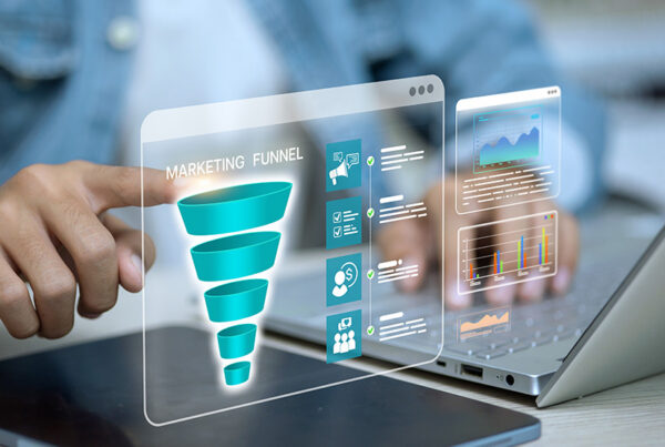 business man pointing at marketing funnel and demand generation dashboard
