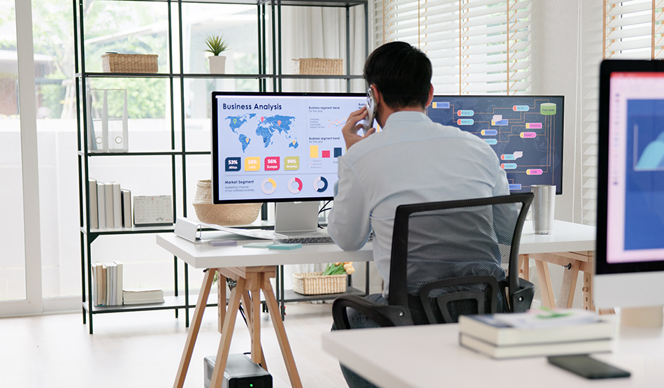 product marketing manager at desk reviewing business analytics